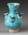 A KASHAN TURQUOISE GLAZED POTTERY VASE, PERSIA, 13TH CENTURY