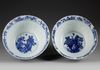 A PAIR OF BLUE AND WHITE MOULDED 'LOTUS' BOWLS, KANGXI PERIOD (1662-1722)