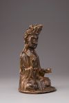 A Chinese gilt bronze seated figure of Guanyin