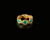 A HELLENISTIC GOLD RING WITH EMERALD CABOCHONS