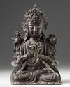 A CHINESE GILT LACQUERED BRONZE GUANYIN