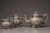 A three-piece export silver tea set
