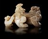 A CHINESE JADE OF AN IMMORTAL RIDING A BIXIE,  HAN DYNASTY (206 BC–220 AD)
