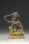 A gilt bronze figure of Manjusri