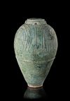 A LARGE UMAYYAD TURQUOISE-GREEN GLAZED JAR, MESOPOTAMIA, 7TH-8TH CENTURY