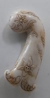 A MUGHAL JADE DAGGER HILT, NDIA, 20TH CENTURY