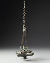 A BYZANTINE FOUR SPOUTED LAMP, 6TH-7TH CENTURY AD