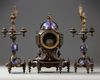 A CLOCK SET, 'VIOLET LE DUC' STYLE, CIRCA 1870