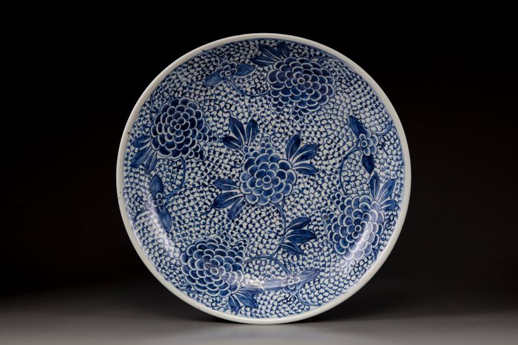 A blue and white porcelain charger