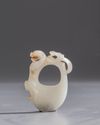 A white jade 'chilong' chicken heart pendant