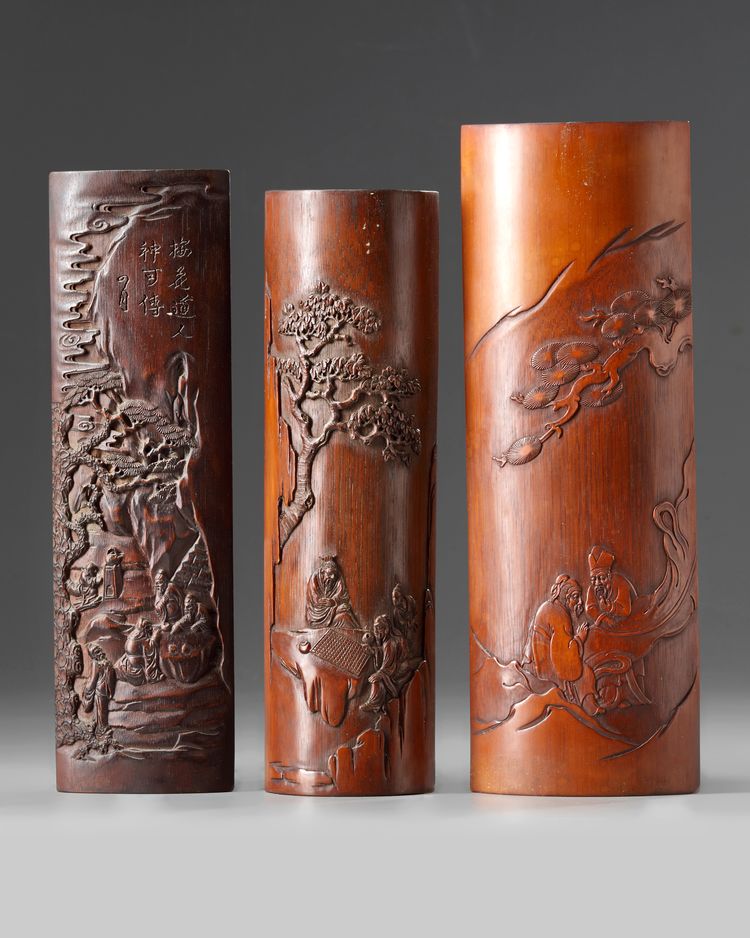 A GROUP OF THREE CHINESE CARVED BAMBOO 'SCHOLARS' WRIST RESTS, 20TH CENTURY