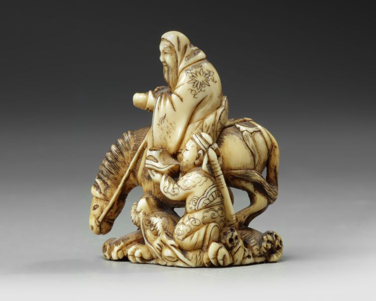 A JAPANESE IVORY NETSUKE, EDO PERIOD (1603-1868)
