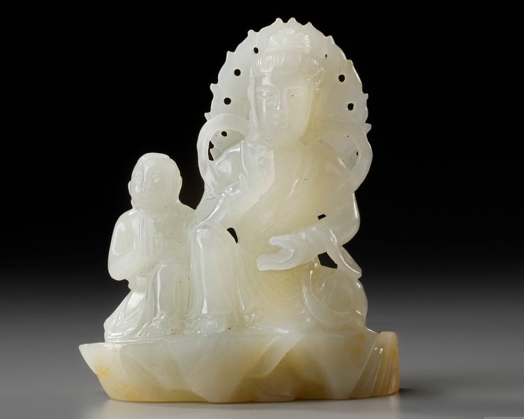 A CHINESE WHITE JADE 'GUANYIN AND ACOLYTE' CARVING, 20TH CENTURY