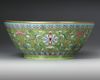 A  LARGE FAMILLE ROSE GREEN-GROUND BOWL DAOGUANG SIX-CHARACTER SEAL MARKS IN IRON RED AND OF THE PERIOD (1821-1850)