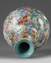 A Chinese famille rose millefleurs bottle vase