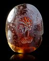 A LATE ROMAN GARNET INTAGLIO, 4TH CENTURY AD