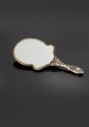 AN OTTOMAN CORAL-INSET GILDED MIRROR, 19TH CENTURY