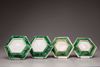 Two pairs of hexagonal biscuit porcelain sweetmeat dishes