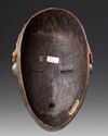 AN AFRICAN MASK, EARLY 20TH CENTURY