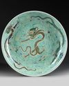 A CHINESE FAMILLE VERTE 'DRAGON' CHARGER, QING DYNASTY (1644-1911)