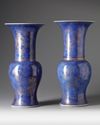 A pair of Chinese powder blue-ground gilt-decorated phoenix tail vases