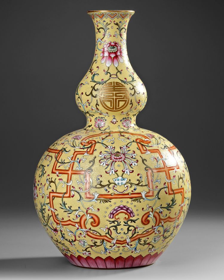 A CHINESE FAMILLE ROSE DOUBLE-GOURD YELLOW GROUND VASE, 20TH CENTURY