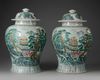 A PAIR OF CHINESE FAMILLE ROSE VASES WITH COVERS, 20TH CENTURY