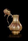 AN OTTOMAN GILT-COPPER (TOMBAK) BOZALIK (BOZA EWER), TURKEY, DATED 1194 AH/1780 AD