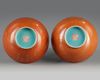 A pair of Chinese coral-ground gilt-decorated bowls