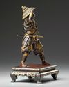 A Japanese parcel gilt bronze figure of a Samurai