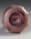 A PURPLE GLASS SPRINKLER FLASK, PERSIA OR SYRIA, 9TH–11TH CENTURY
