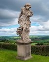 A SCULPTED LIMESTONE FIGURE OF AENEAS, 18TH CENTURY
