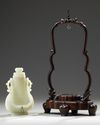A CHINESE PALE JADE HANGING VASE WITH COVER AND HARDWOOD STAND