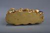 A CHINESE GILT BRONZE HARDSTONE INLAID-BRUSK REST, CHINA, 19TH CENTURY