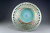 A large Chinese turquoise-ground famille rose 'birthday' dish