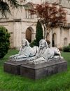 A PAIR OF SCULPTED MARBLE MODELS OF EGYPTIAN SPHINXS, SECOND HALF 20TH CENTURY