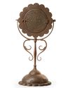 A GILT DECORATED METAL MIRROR HOLDER