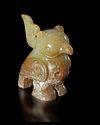A GREENISH-YELLOW JADE CARVING OF A BIRD, CHINA, SHANG DYNASTY
