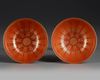 A PAIR OF CHINESE RED GLAZED BOWLS WITH CHARACTERS, 19TH CENTURY