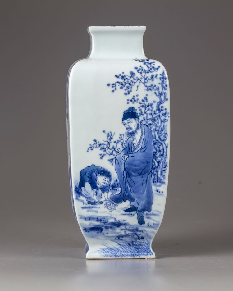 A blue and white square-section vase