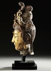 A LARGE GILT BRONZE HEAD OF GUANYIN, MING DYNASTY OR LATER