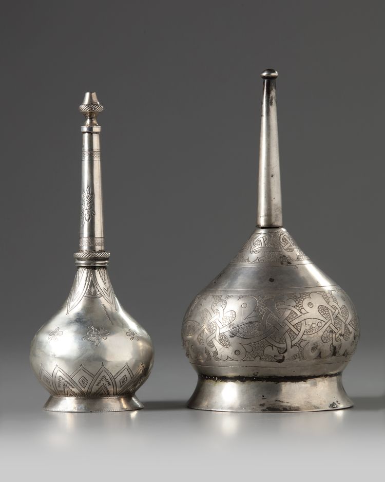 Two Islamic silver sprinklers