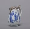 A blue and white milk jug