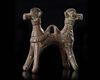 A BRONZE DOUBLE HEADED MYTHOLOGICAL ANIMAL, LURISTAN PERIOD, 1ST MILLENNIUM BC