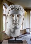 A GRAND TOUR SCULPTED WHITE MARBLE HEAD 19TH CENTURY, AFTER THE MANNER OF ROMAN EXAMPLES