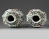 A pair of Chinese moulded famille verte vases
