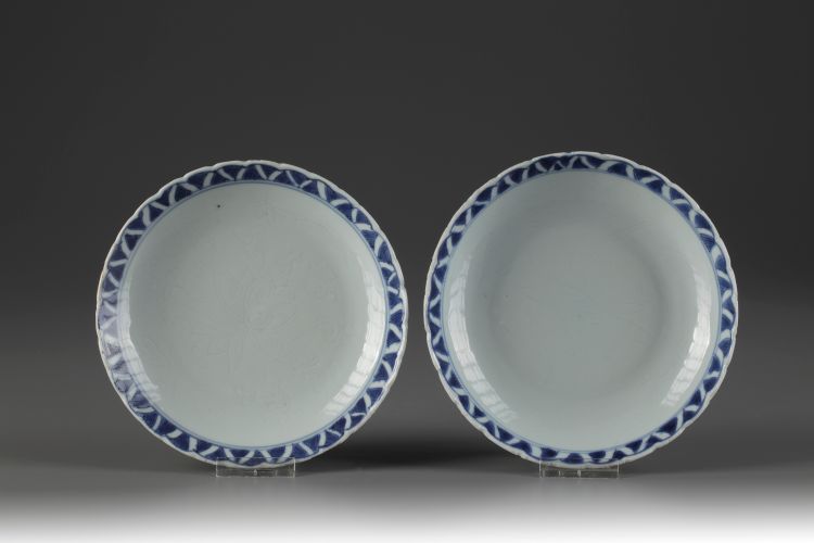 A near pair of blue and white dishes