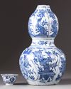 An unusual Chinese blue and white double-gourd vase