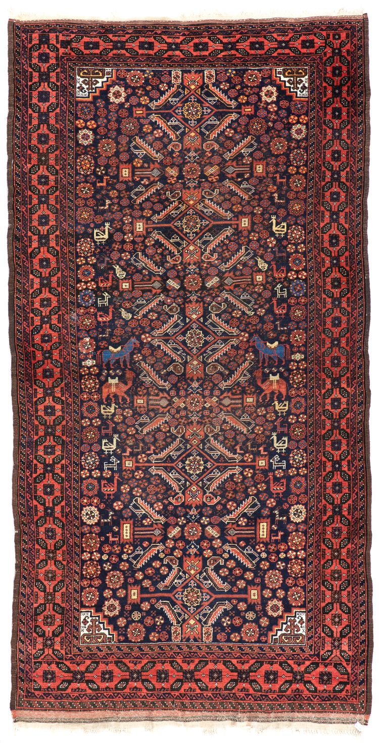 A BELUTSCH RUG WITH PARADISE DESIGN AND ANIMALS, LATE 19TH CENTURY