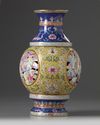 A Chinese famille rose 'Eighteen Luohan' revolving vase